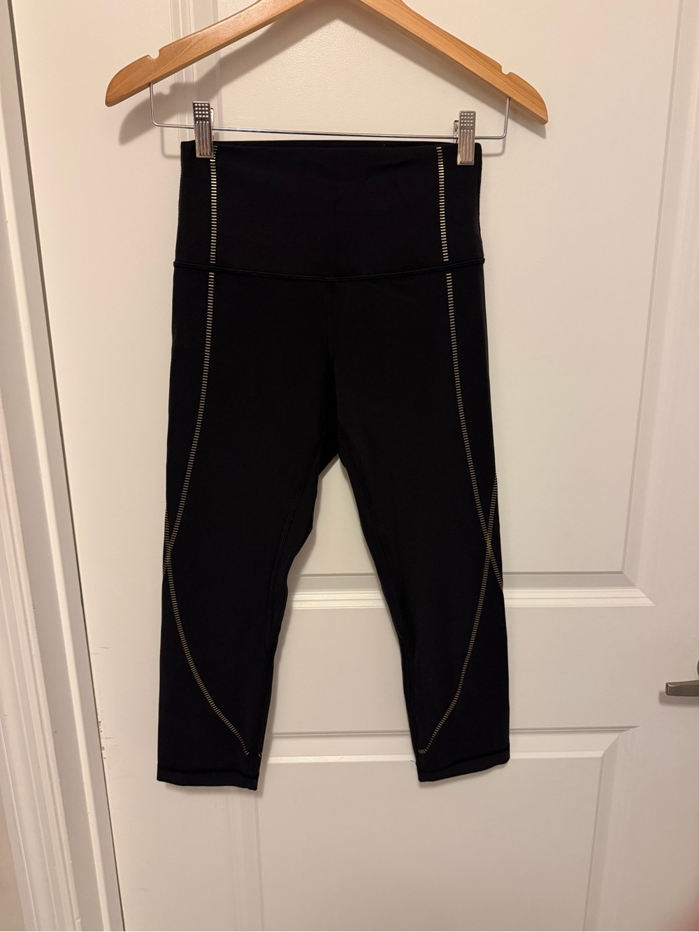 lululemon align Black & gold Capri Leggings.